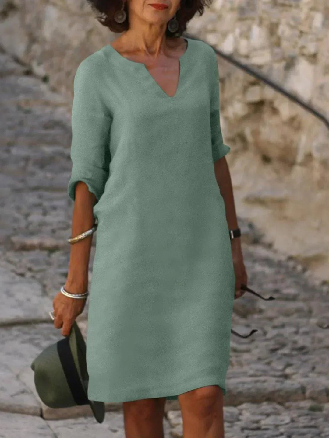 Elegantes Damenkleid mit V-Ausschnitt für stilvolle Anlässe und Alltag 3