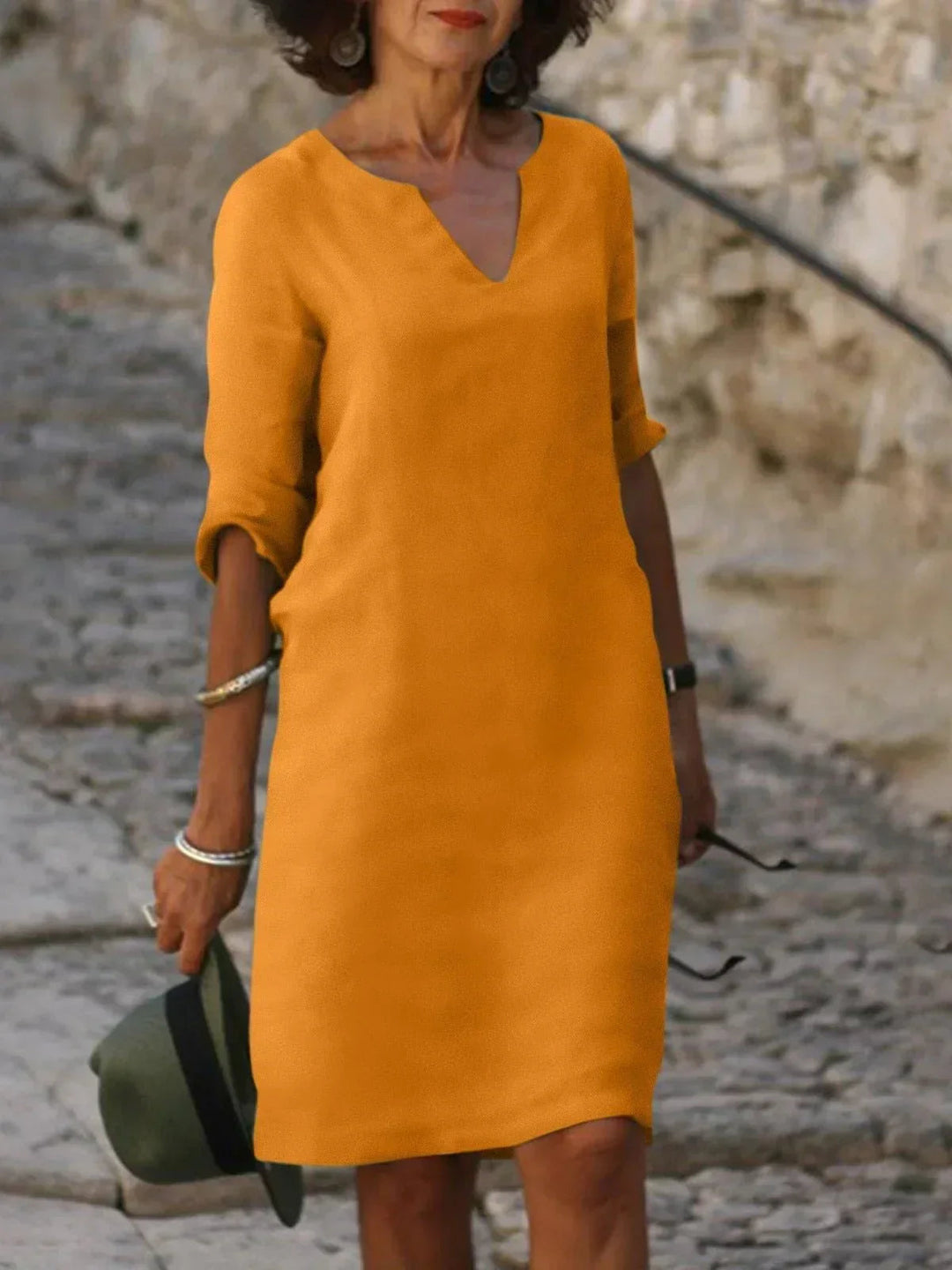 Elegantes Damenkleid mit V-Ausschnitt für stilvolle Anlässe und Alltag 4