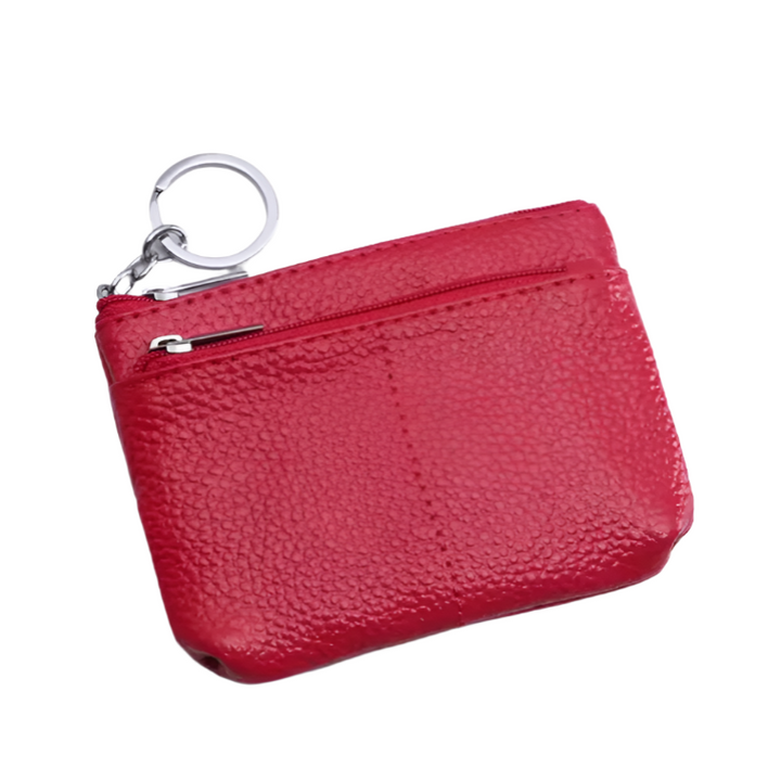 Arely | Kompakte Reisetasche aus echtem Leder mit Schlüsselhalter